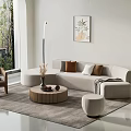 Modern Beige Sofa and Round Coffee Table Set with Pillows Floor Lamp and Green Plants