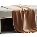 Modern Upholstered Sofa Bench With Neutral Fabric Metal Legs And Brown Throw Blanket