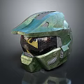 Green Futuristic Helmet With Metallic Surface Design And Transparent Visor Details