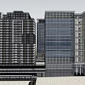 Modern Office Building Complex With Multiple High Rise Structures And Green Plaza