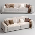 Modern Two Seater Sofa With Brown White Dark Brown Cushions And Brown Blanket