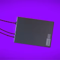 Modern Digital Device with Red Cables Green Indicator Lights and Circular Knob on Purple Background