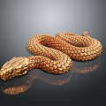 Shiny Golden Reptile Snake with Scaled Skin Coiled on Dark Reflective Surface