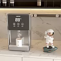 Modern Kitchen Countertop With Digital Water Dispenser And Astronaut Figurine On Marble Background