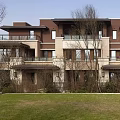 Modern Property Sales Office Exterior With Multi Storey Building Green Lawn And Trees