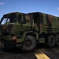 Military Transport Truck With Camouflage Pattern And Large Off Road Tires