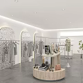 Modern Clothing Store With White Walls Marble Floors Hanging Clothes Mannequins Plants And Round Table