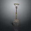 Decorative Metal Shovel With Green Red Accents And Ornate Handle Design
