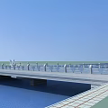 Modern Bridge Over Blue Water With White Railings And Tiled Walkway