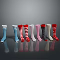 Colorful Patterned Socks Collection with Stripes Polka Dots Snowflake Designs Neatly Arranged on Grey Background