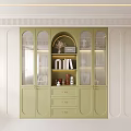 Light Green Bookcase With Glass Doors And Drawers Against Light Colored Walls
