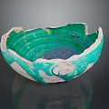 Broken Ceramic Bowl With Green And White Glaze Cracks And Chips
