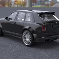 Rolls Royce Black Luxury SUV With Sleek Design Large Alloy Wheels And Distinctive Front Grille