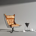 Modern Brown Leather Armchair With Metal Frame And Geometric Decorations Near Side Table