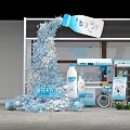 Blue Themed Art Installation With Floating Milk Bottle And Scattered Decorations