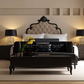 Elegant Double Bed With Tufted Headboard Nightstands Table Lamps And Yellow Flowers In Bedroom