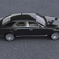 Black Bentley Luxury Sedan with Chrome Grille Headlights and Light Beige Leather Seats Interior