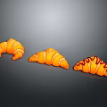 Sculpture Carving Of Three Orange Croissants With Striped Surface Design Details