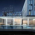 Modern Office Building Exterior With Glass Curtain Wall And Water Pool At Night