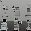 Multiple Mobile Medical Devices Featuring Monitoring Screens And Surgical Equipment Carts
