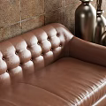 Brown Tufted Leather Sofa Coffee Table Set With Tile Wall And Wall Lamps