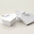 Heart Shaped Gift Boxes With Red Bows And Striped Design Open With Polka Dot Lining