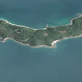 Aerial View Of Tropical Island With Green Vegetation And White Sandy Beach