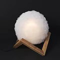 White Fluffy Cloud Like Decorative Lamp With Illuminated Sphere And Wooden Triangular Stand