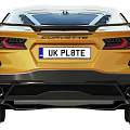 Yellow Corvette Sports Car With Sleek Body Design Black Alloy Wheels And Modern Front Fascia