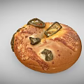 Freshly Baked Golden Brown Bagel Topped With Green Chili Slices