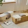 Modern Cream and Beige Ottoman Benches with Striped Details on Round Rug and Throw Blanket