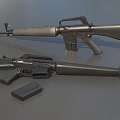 Two Metal Military Rifles With Detachable Magazine On Gray Surface