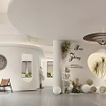 Modern Bridal Shop Interior With White Curved Walls Green Plants And Comfortable Seating