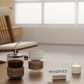 Table With Coffee Cups Reserved Sign Candle And Wooden Chair By Window