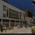 Modern Commercial Street With Shops Pedestrian Area And Colorful Hot Air Balloons
