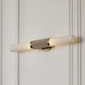 Elegant Modern Cylindrical Wall Lamp With Gold Accent Mounted On White Wall