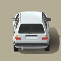 White Classic Volkswagen Hatchback With Sleek Body And Alloy Wheels