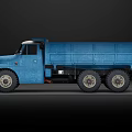 Blue Vintage Six Wheel Truck With Open Bed For Utility Transportation