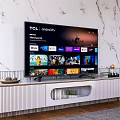 TCL Android TV With Streaming Apps On Modern Living Room TV Stand