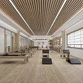 Spacious Modern Fitness Gym Interior With Wooden Floors Pilates Reformers And Natural Light