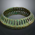 Ancient Bronze Circular Sculpture Carving With Hollowed Out Patterns And Green Patina