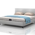 Modern Double Bed with Grey Upholstered Headboard Two Beige Pillows Blue Throw Blanket Black Legs