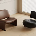 Modern Leather Sofa Stools In Brown And Black With Curved And Round Designs