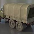 Green Military Truck With Canvas Cargo Cover And Six Wheels Design