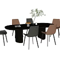Modern Dining Table Set with Oval Dark Wood Top and Gray Pink Chairs Decorative Plant