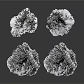Silver Mountain Shaped Decorative Models With Textured Surfaces Against Black Background