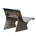 Modern Metallic Curved Leisure Chair With Unique Design Sleek Structure And Sturdy Base