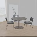 Modern Round Dining Table Set With Metal Frame Chairs And Minimalist Wall Art Painting