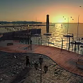 Beautiful Sunset Scenery At Marina With Lighthouse Sailboats Calm Water And Wooden Deck