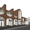 Modern Commercial Street With Red Brick Buildings Arched Windows Glass Doors And Trees